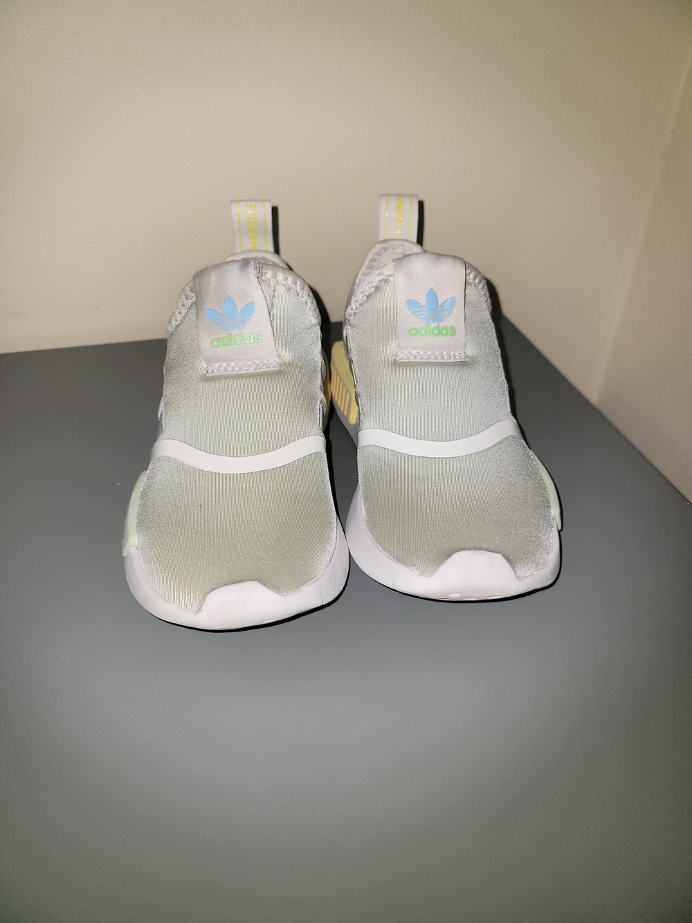 Adidas NMD Kids Slip-On Sneakers in Light Green & White and yellow.